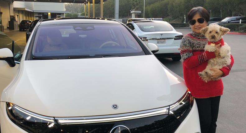 Christine Orita with her new Mercedes-Benz EQS 450+ and old Tesla Model S.Christine Orita