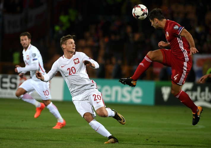 Łukasz Piszczek (L) i Taron Woskanjan (P)