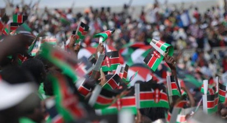 Kenyans waving flags