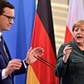 epa09602570 Acting German Chancellor Angela Merkel (R) and Prime Minister of Poland Mateusz Morawiecki give press statements after talks in Berlin, Germany, 25 November 2021. EPA/JOHN MACDOUGALL / POOL Dostawca: PAP/EPA.