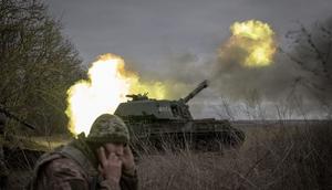 A Ukrainian soldier fires towards the Russian position at the frontline in the direction of Avdiivka, Ukraine.Anadolu via Getty