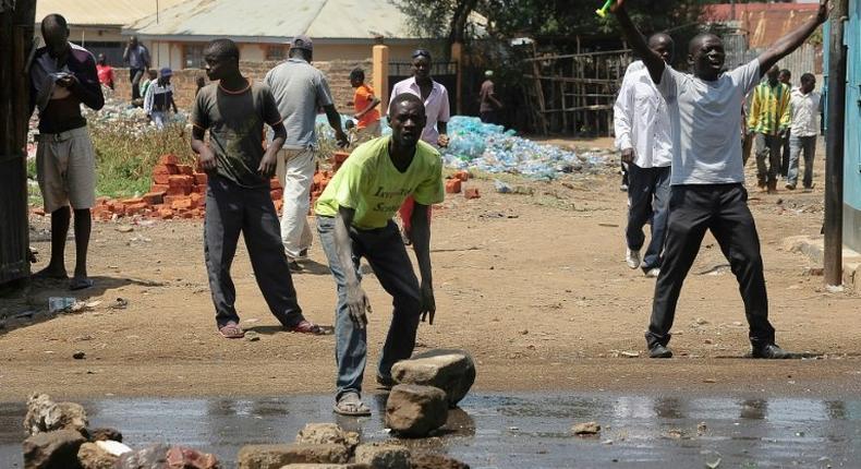 National Super Alliance (NASA) opposition coalition supporters demonstrate in the streets of the Kondele Estate in Kisumu, along Lake Victoria, demanding their candidate to be named the winner in the general elections on August 11, 2017