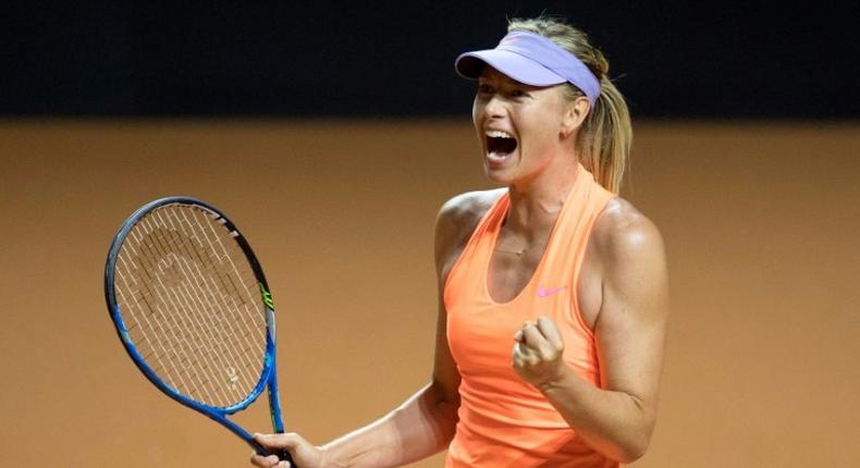 Russia's Maria Sharapova celebrates after defeating Russia's Ekaterina Makarova in their second round match at the WTA Porsche Tennis Grand Prix in Stuttgart, southwestern Germany, on April 27, 2017