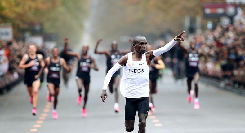 Kenya's Eliud Kipchoge, the marathon world record holder, crosses the finish line during his attempt to run a marathon in under two hours in Vienna, Austria, October 12, 2019. REUTERS/Lisi Niesner