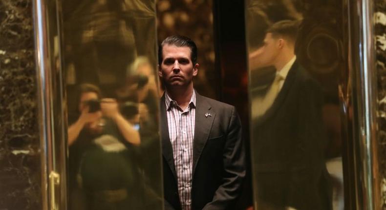 Donald Trump Jr., seen here at Trump Tower last January just before his father's inauguration, admitted to meeting last year with a Russian lawyer in a bid to get dirt on Democratic presidential nominee Hillary Clinton