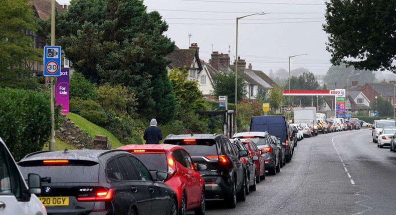 Motorists queue for fuel at an ESSO petrol station in Ashford, Kent.
