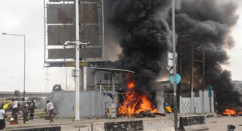 Hoodlums masquerading as #END FSARS protesters set ablaze Orile Iganmu Divisional Police Station along Lagos Badagry ExpressWay, on Tuesday. Oct. 20, 2020 (NAN photo)