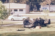 A Tesla Model S involved in the fatal crash on is shown with the top third of the car sheared off by