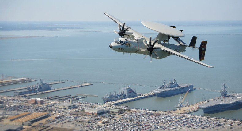 An E-2D Hawkeye over Naval Station Norfolk on March 20, 2014.