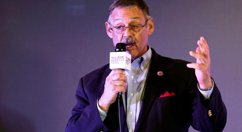 State Rep. Mark Finchem, of Arizona, gestures as he speaks during an election rally in Richmond, Va., on Oct. 13, 2021.