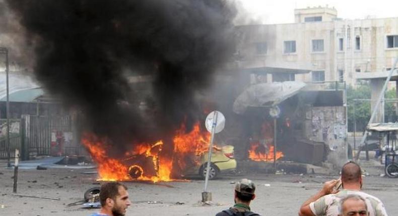 Blasts kill more than 100 in Syrian government stronghold