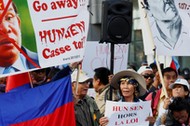 Protesters attend a protest against Cambodia's Prime Minister Hun Sen during the EU-Asia leaders sum