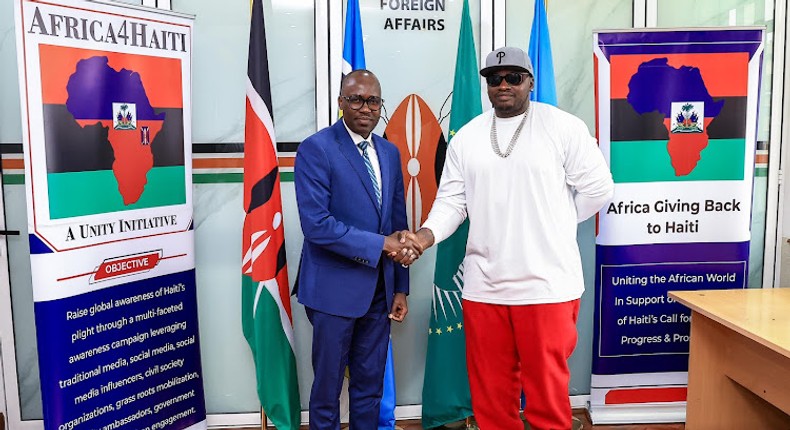 File image of Foreign Affairs Principal Secretary Dr. Korir Sing’oei with Khaligraph Jones who will be headlining the ‘Harmony for Haiti’ concert