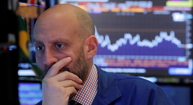 A trader works on the floor of the New York Stock Exchange (NYSE) in New York, U.S., October 23, 2018.REUTERS/Brendan McDermid