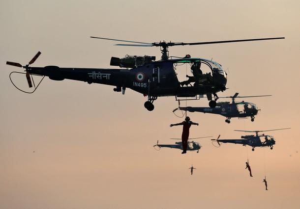 Indian Navy marine commandos demonstrate their skills during a rehearsal ahead of Navy Day celebrati