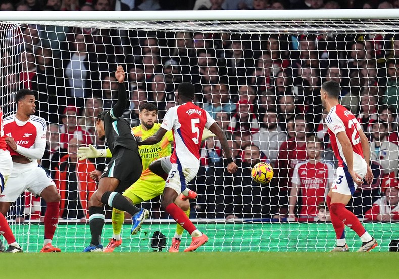 Virgil van Dijk swerving Thomas Partey to score
