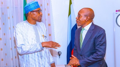 Former President Muhammadu Buhari and suspended CBN governor, Godwin Emefiele.