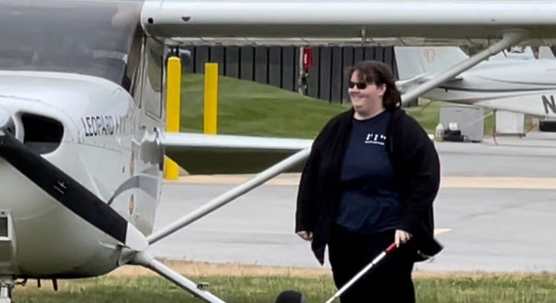 Kaiya Armstrong walking away from plane after landing in Washington DC.The Foundation for Blind Children