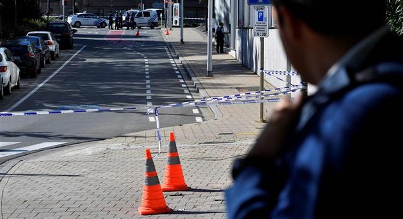 A security perimeter has been set around the scene where two police officers were stabbed in Brussels