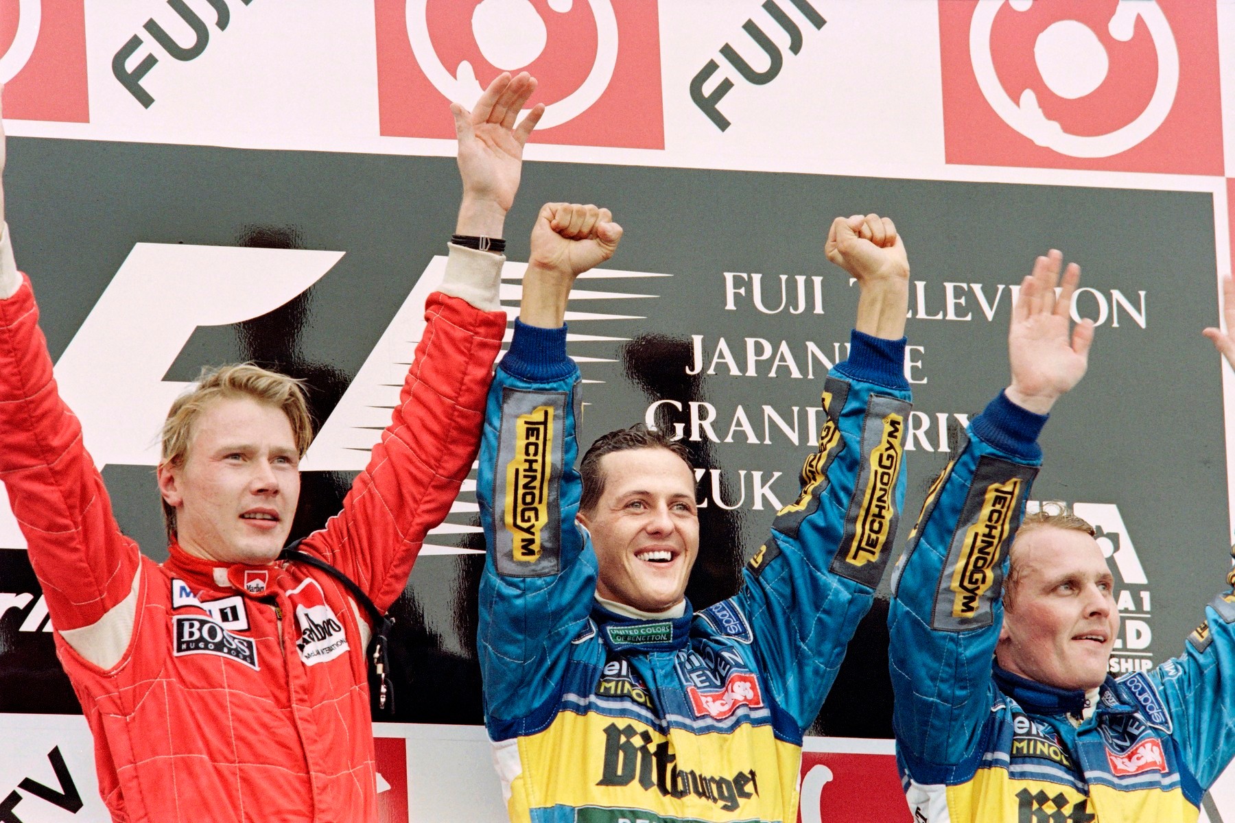 Mika Hakkinen, Michael Schumacher a Johnny Herbert v roku 1995.