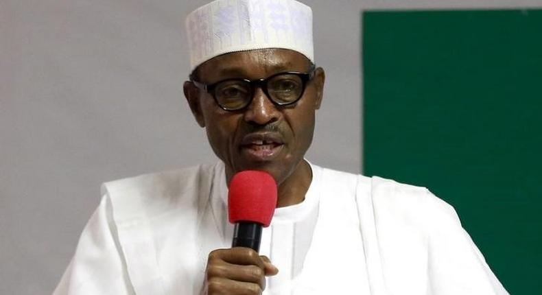 President Muhammadu Buhari addresses members of the National Working Committee during the meeting of the All Progressives Congress (APC) party at the headquarters of the party in Abuja, Nigeria July 3, 2015.  REUTERS/Afolabi Sotunde