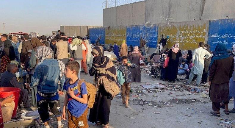 People who want to flee the country continue to wait around Hamid Karzai International Airport in Kabul, Afghanistan on August 25, 2021.
