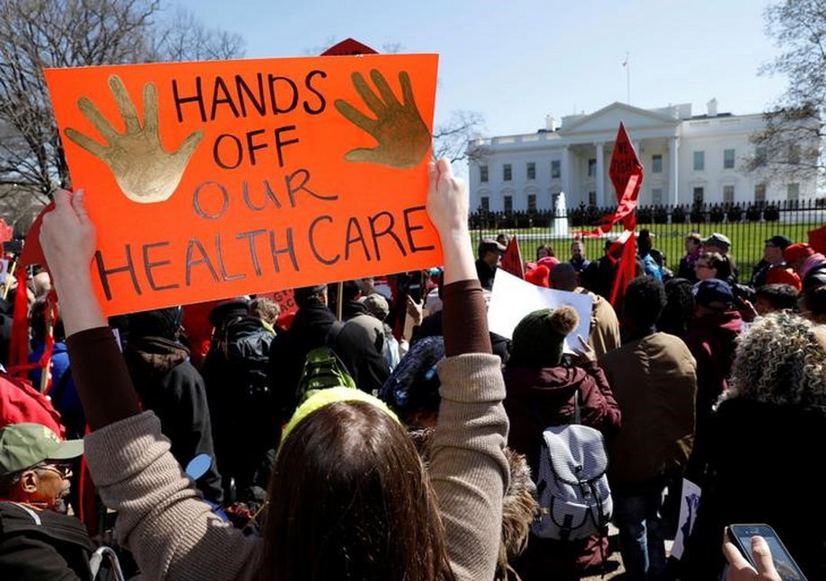 FILE PHOTO: Healthcare demonstrators protest at the White House in Washington