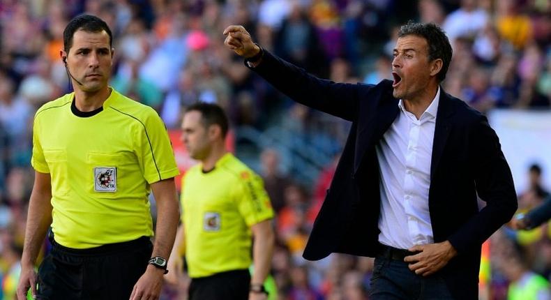 Luis Enrique (right) gives instructions during Barcelona's match against Deportivo de la Coruna at the Camp Nou on October 15, 2016