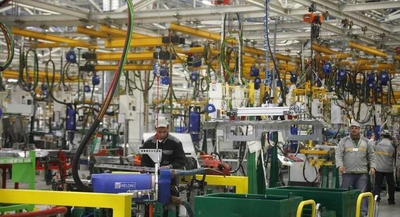 Moroccan employees work in the new Renault factory in Melloussa, 30 km (19 miles) from Tangiers February 9, 2012.    REUTERS/Stringer