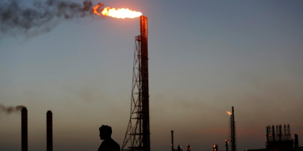 A man stands close to the Cardon refinery, which belongs to the Venezuelan state oil company PDVSAn in Punto Fijo.