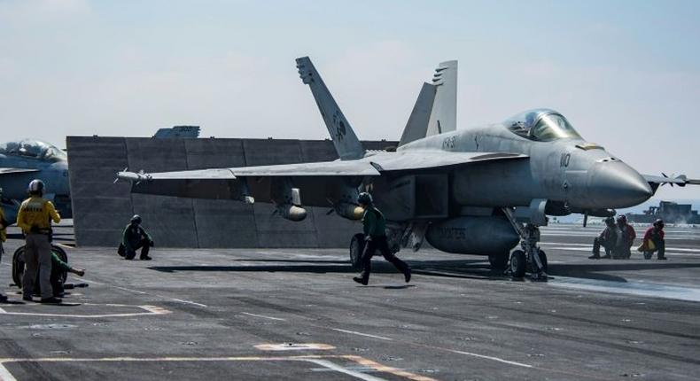 An F/A-18E Super Hornet attached to the Tomcatters of Strike Fighter Squadron (VFA) 31 on the deck of the Nimitz-class aircraft carrier USS George H.W. Bush to conduct flight operations in support of Operation Inherent Resolve on June 6, 2017