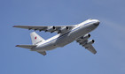 An Antonov An-124-100 Ruslan strategic airlift jet aircraft flies over the Red Square during the Victory Day parade in Moscow