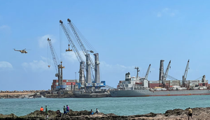 Security helicopters hover above the Mogadishu Sea Port after an Egyptian warship docked to deliver a second major cache of weaponry in Mogadishu, Somalia September 23, 2024 REUTERS(Feisal Omar)