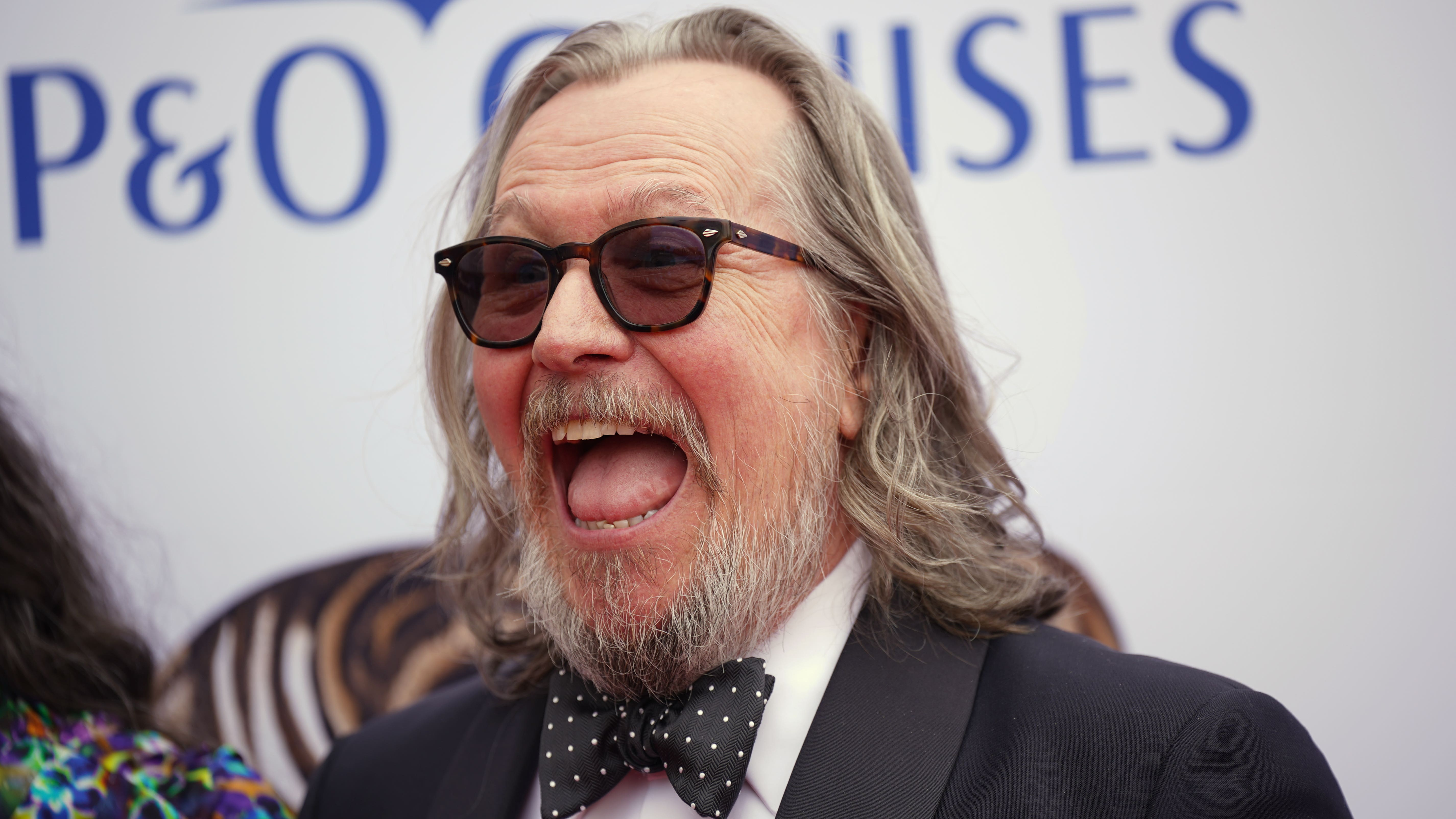 Gary Oldman knighted at Windsor Castle ceremony