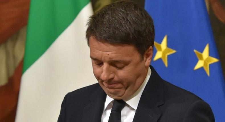 Italy's Prime Minister Matteo Renzi announces his resignation during a press conference at the Palazzo Chigi following the results of the vote for a referendum on constitutional reforms, on December 5, 2016 in Rome