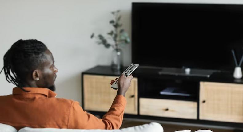 A man watching TV