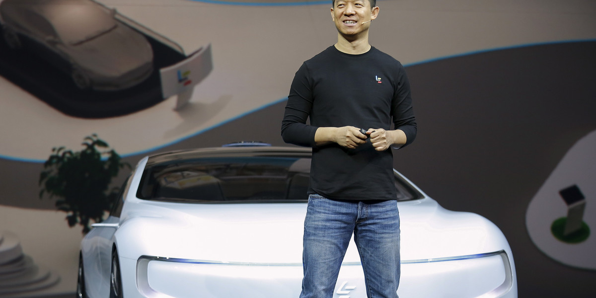 Jia Yueting, cofounder and head of Le Holdings Co Ltd, also known as LeEco and formerly as LeTV, unveiling an all-electric battery "concept" car called LeSEE at a ceremony in Beijing on April 20.