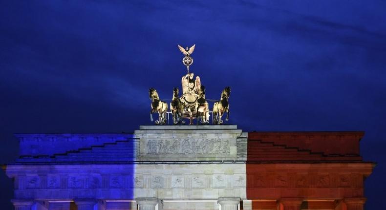 Germany's Brandenburg Gate lit up in the French national colours after Islamic extremists went on the rampage in Paris, killing 130 people