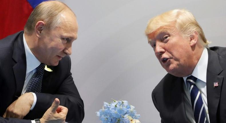 US President Donald Trump (right) and Russia's President Vladimir Putin speak on the sidelines of the G20 Summit in Hamburg, Germany, on July 7, 2017