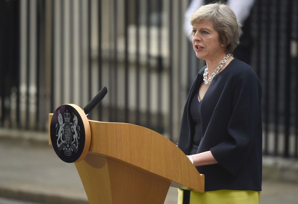 Britain's Prime Minister, Theresa May, speaks to the media outside number 10 Downing Street, in cent