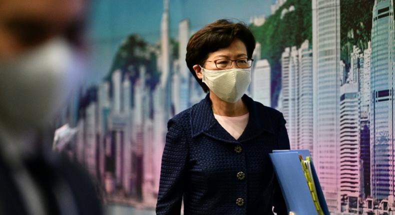 The United States has imposed sanctions on Hong Kong Chief Executive Carrie Lam, seen here leaving a news conference on July 31, 2020