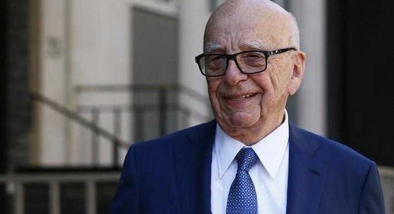 Media mogul Rupert Murdoch leaves his home in London.