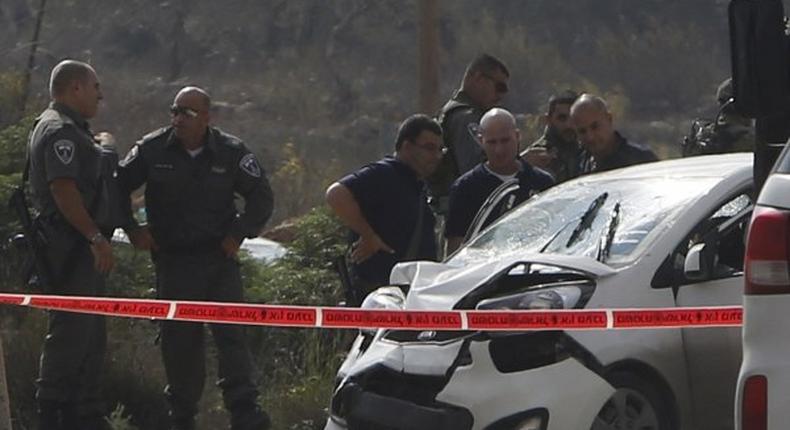 Palestinian rams car into Israelis, then shot dead -police