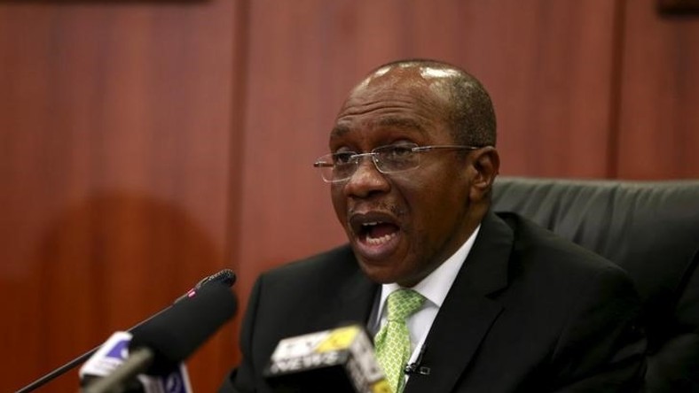 Governor Godwin Emefiele announces that Nigeria's central bank is keeping its benchmark interest rate on hold at 13 percent in Abuja, Nigeria, July 24, 2015. REUTERS/Afolabi Sotunde