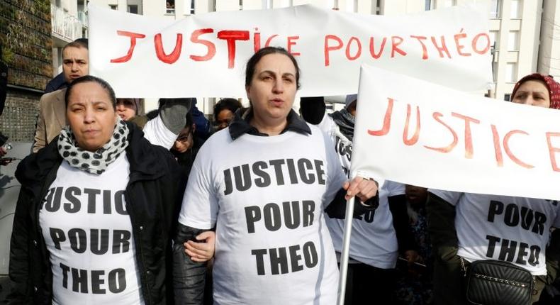 Protesters holding signs calling for Justice for Theo march on Monday in the Paris suburb of Aulnay-sous-Bois, referring to the man who was allegedly sodomised during a police arrest last week
