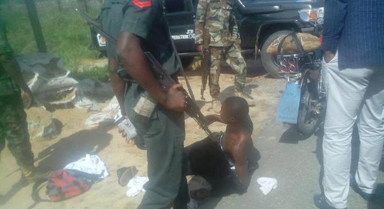 Suspect arrested by soldiers