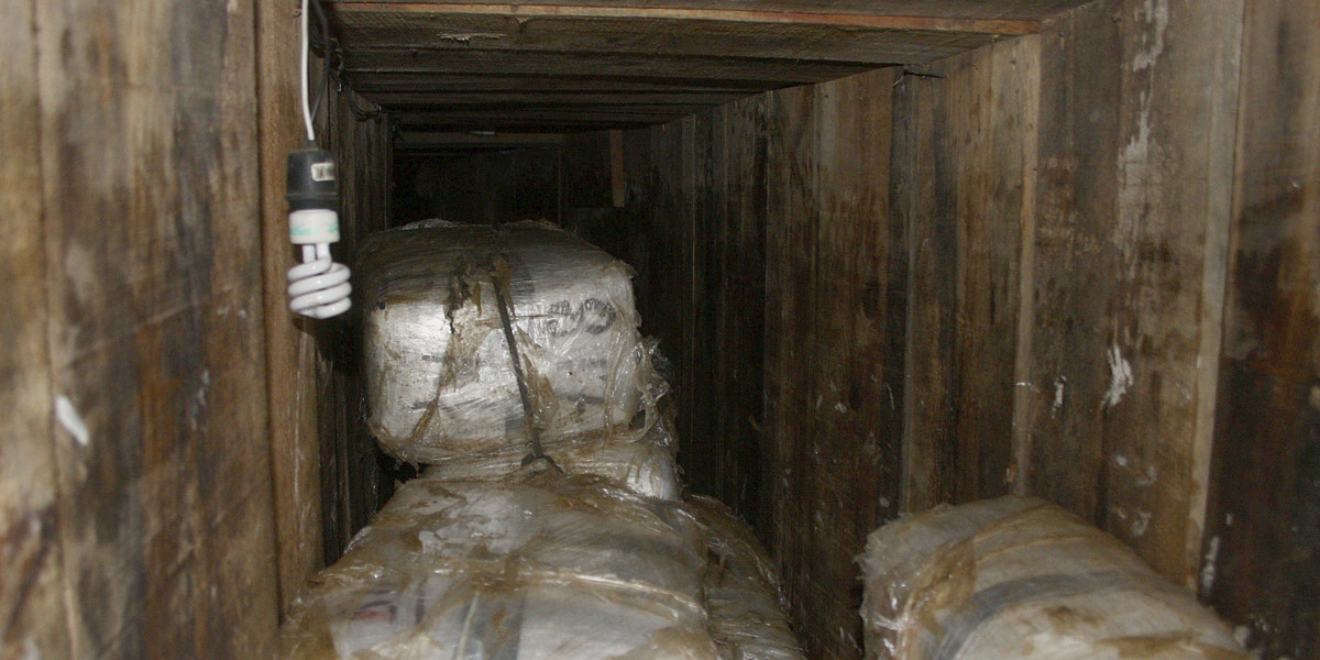 Packs of marijuana are stored in a tunnel in Tijuana, November 3, 2010.