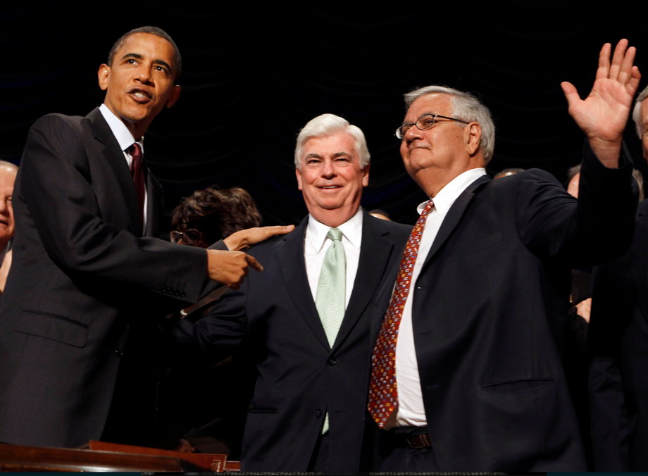 U.S. President Barack Obama points to co-sponsors of the Dodd-Frank Wall Street Reform and Consumer Protection Act after signing it into law at the Ronald Reagan Building in Washington, July 21, 2010.