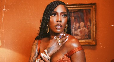 Tiwa Savage calls out Wizkid fan for bullying