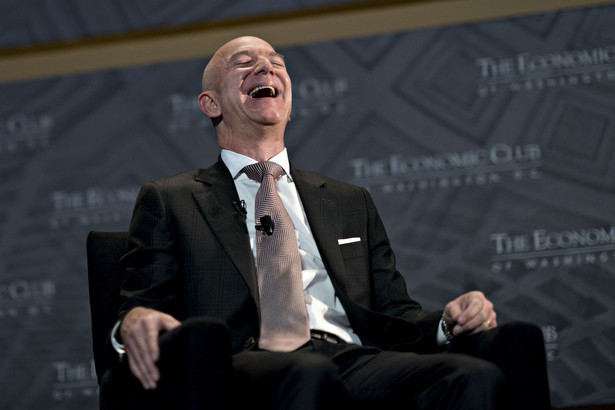 Jeff Bezos, founder and chief executive officer of Amazon.com Inc., laughs during an Economic Club of Washington discussion in Washington, D.C., U.S., on Thursday, Sept. 13, 2018. Bezos, the world's richest person, is launching a $2 billion fund called the Bezos Day One Fund to help homeless families and create a network of non-profit preschools in low-income communities. Photographer: Andrew Harrer/Bloomberg